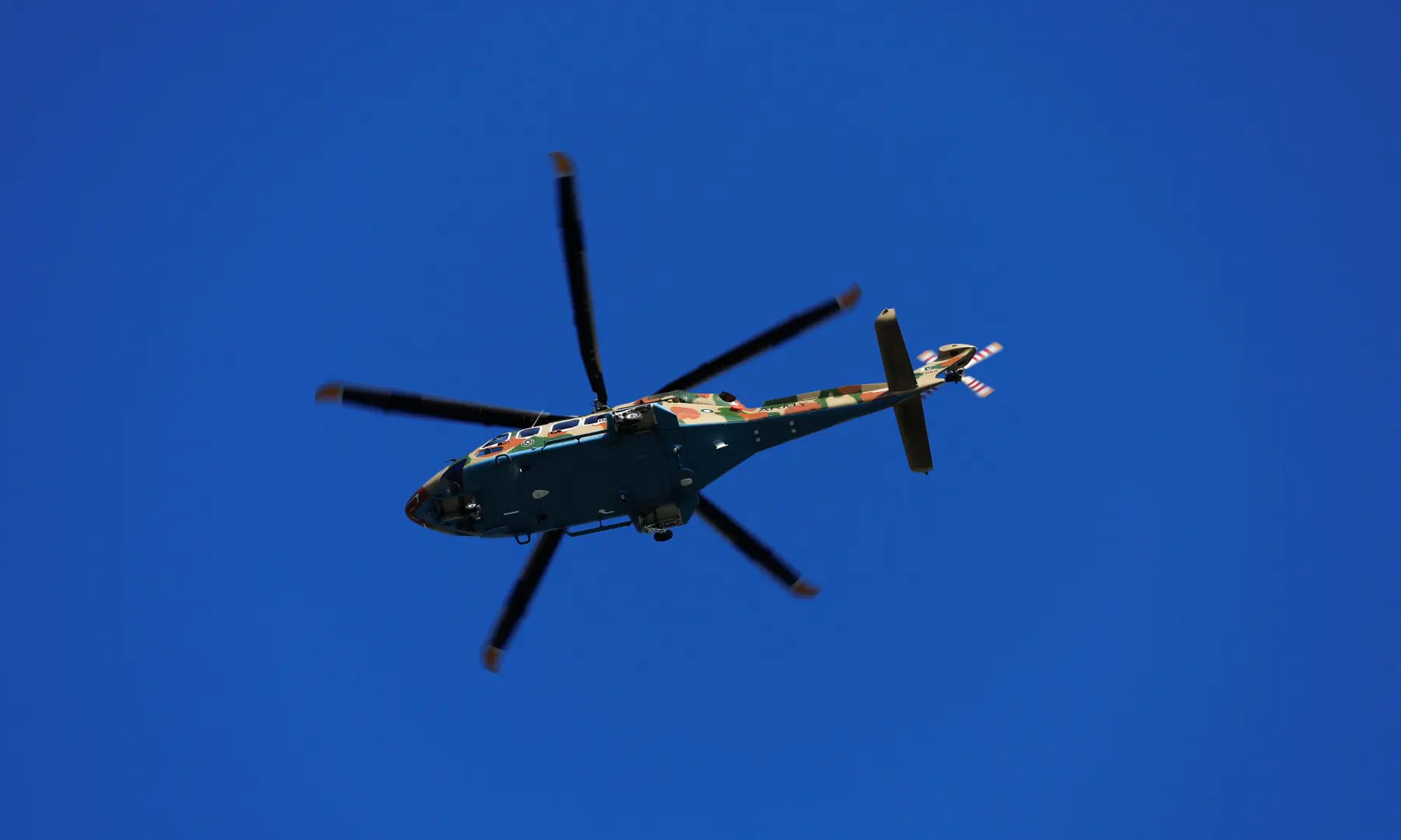 An army helicopter flies over Islamabad after US and Iranian officials failed to reach an agreement to end their war following peace talks, in Islamabad on April 12, 2026. &mdash; Reuters