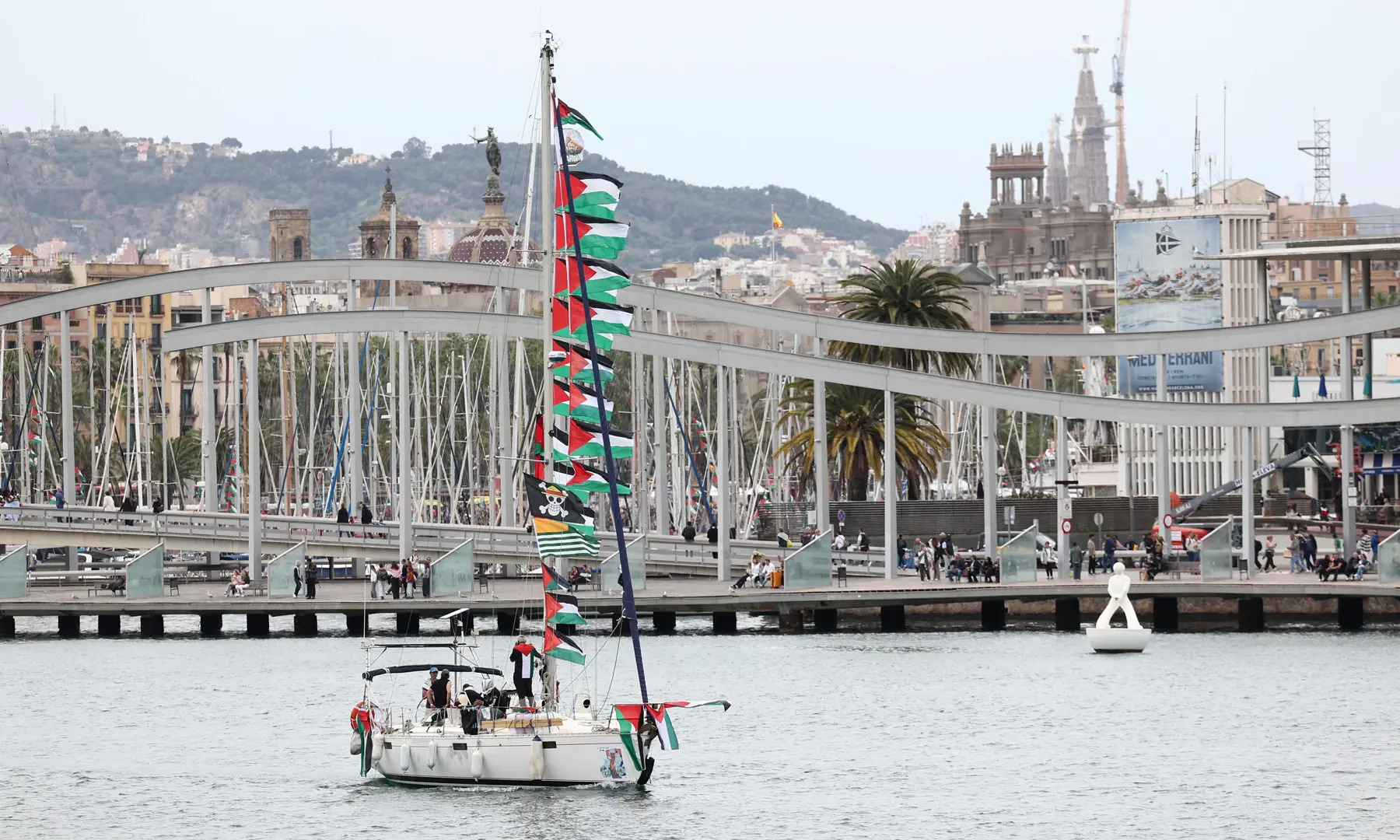 A boat of a new humanitarian flotilla bound for the Gaza Strip makes a symbolic leave from Barcelona’s Port Vell on April 12, 2026. — AFP A boat of a new humanitarian flotilla bound for the Gaza Strip makes a symbolic leave from Barcelona’s Port Vell on April 12, 2026. — AFP