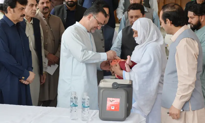 KP Health Minister Khaleequr Rehman administers polio vaccination drops to a child to launch the polio campaign, in Peshawar on April 13, 2026. — via author KP Health Minister Khaleequr Rehman administers polio vaccination drops to a child to launch the polio campaign, in Peshawar on April 13, 2026. — via author