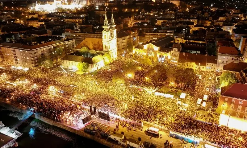 A drone view shows people gathering to celebrate across the River Danube from the Parliament building, following the partial results of the parliamentary election, in Budapest, Hungary on April 12, 2026. — Reuters A drone view shows people gathering to celebrate across the River Danube from the Parliament building, following the partial results of the parliamentary election, in Budapest, Hungary on April 12, 2026. — Reuters