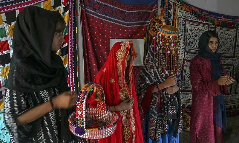 In this photograph taken on Aug 4, 2024 social workers at NGO Sujag Sansar take part in a theatre practice ahead of their performance, intending to create awareness on dangers of child-marriages at the NGO office in Johi, Dadu district of Sindh province. — AFP/ File In this photograph taken on Aug 4, 2024 social workers at NGO Sujag Sansar take part in a theatre practice ahead of their performance, intending to create awareness on dangers of child-marriages at the NGO office in Johi, Dadu district of Sindh province. — AFP/ File