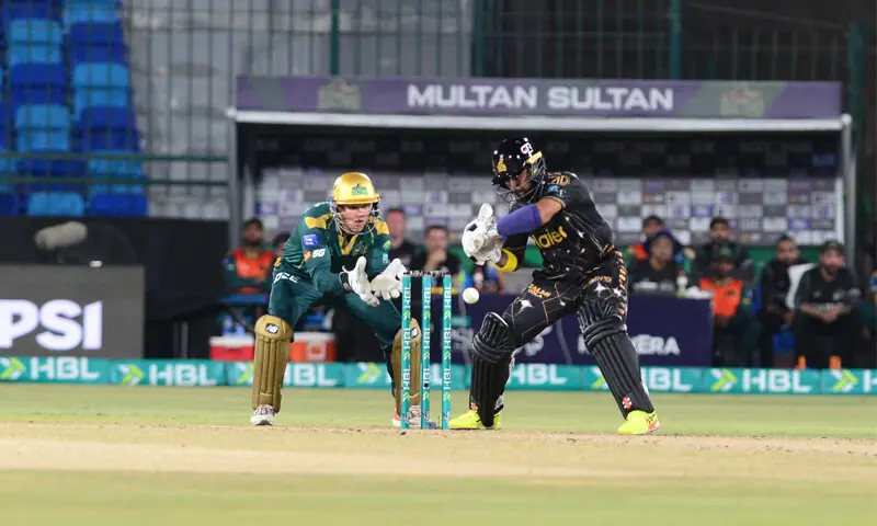PESHAWAR Zalmi batter Kusal Mendis plays a shot as Multan Sultans wicket-keeper Josh Philippe looks on during the Pakistan Super League match at the National Bank Stadium on Monday.—Tahir Jamal/White Star PESHAWAR Zalmi batter Kusal Mendis plays a shot as Multan Sultans wicket-keeper Josh Philippe looks on during the Pakistan Super League match at the National Bank Stadium on Monday.—Tahir Jamal/White Star