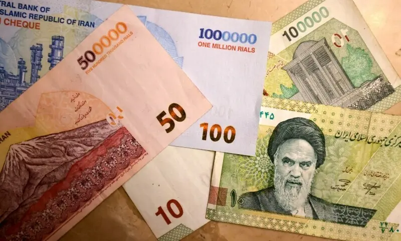 This picture shows Iranian bank notes of one million, 500,000, and 100,000 rials on August 3, 2025. — AFP This picture shows Iranian bank notes of one million, 500,000, and 100,000 rials on August 3, 2025. — AFP