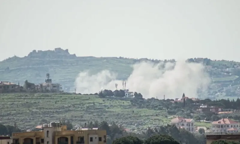 The Crusader fortress of Beaufort Castle stands on the hilltop overlooking smoke billowing from the site of an Israeli airstrike that targeted the southern Lebanese village of Nabatieh al-Faouqa on April 14, 2026. &mdash;AFP