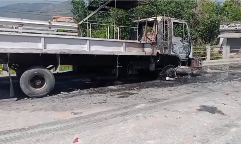 A vehicle stands torched after people protested against the CDA’s anti-encroachment drive in Islamabad on April 14, 2026. — screengrab from video via author A vehicle stands torched after people protested against the CDA’s anti-encroachment drive in Islamabad on April 14, 2026. — screengrab from video via author