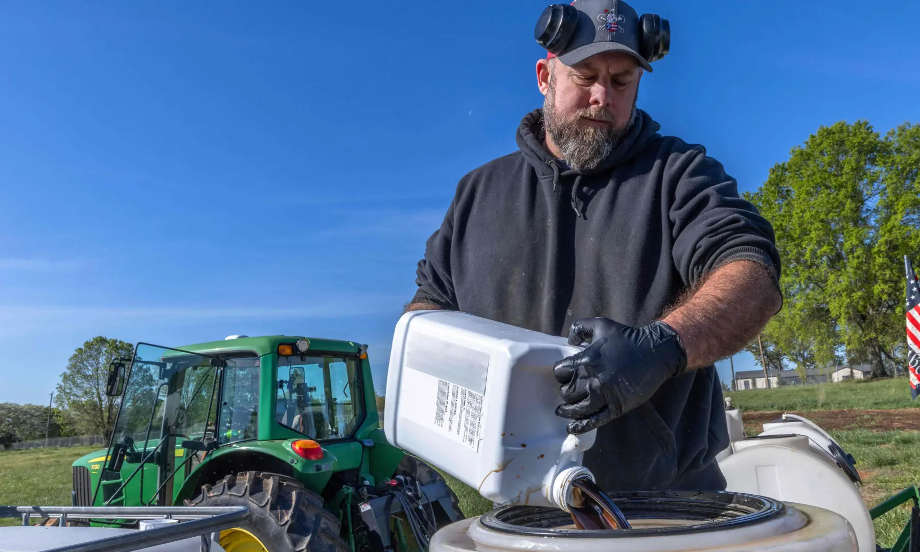 Co-Owner of Soil Regen and first generation farmer, Russell Hedrick, prepares a blend of minerals, biologicals, and fertilisers to be sprayed onto his fields while they are being seeded in Hickory, North Carolina, on April 10, 2026. &mdash; AFP