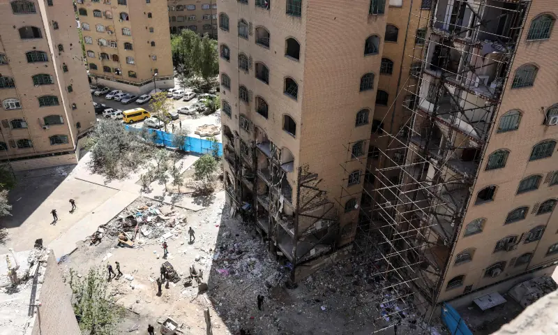 A photograph shows a residential building hit by US-Israel airstrikes days before a two-week ceasefire between Iran and the United States took effect, at the Shahid Broujerdi residential complex in southern Tehran on April 14, 2026. &mdash; AFP