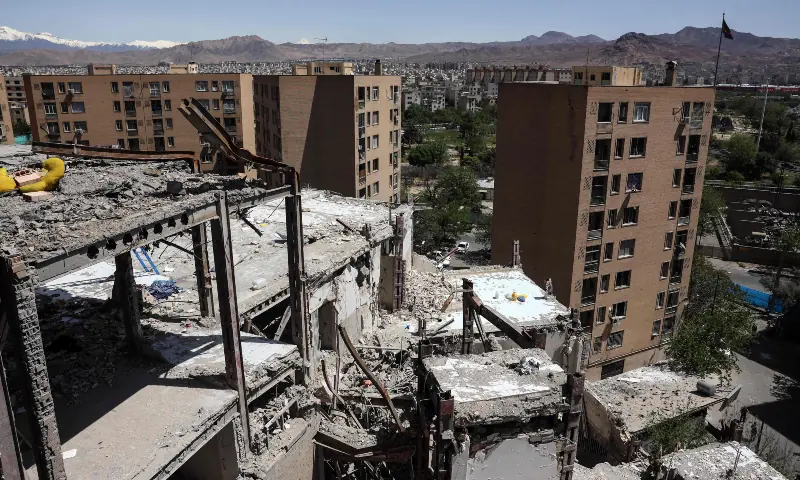 A photograph shows a residential building hit by US-Israel airstrikes days before a two-week ceasefire between Iran and the United States took effect, at the Shahid Broujerdi residential complex in southern Tehran on April 14, 2026. &mdash; AFP