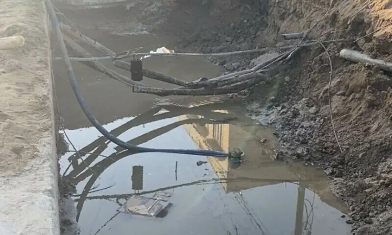 Bare leaking pipes at show in Phase 6, DHA Karachi. &mdash;Dawn/File