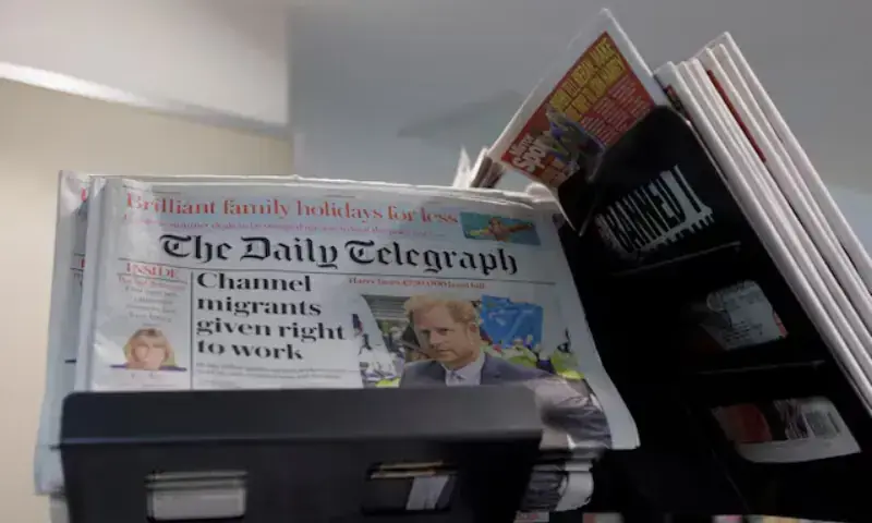 Copies of The Daily Telegraph are displayed on a rack. — Reuters/File Copies of The Daily Telegraph are displayed on a rack. — Reuters/File