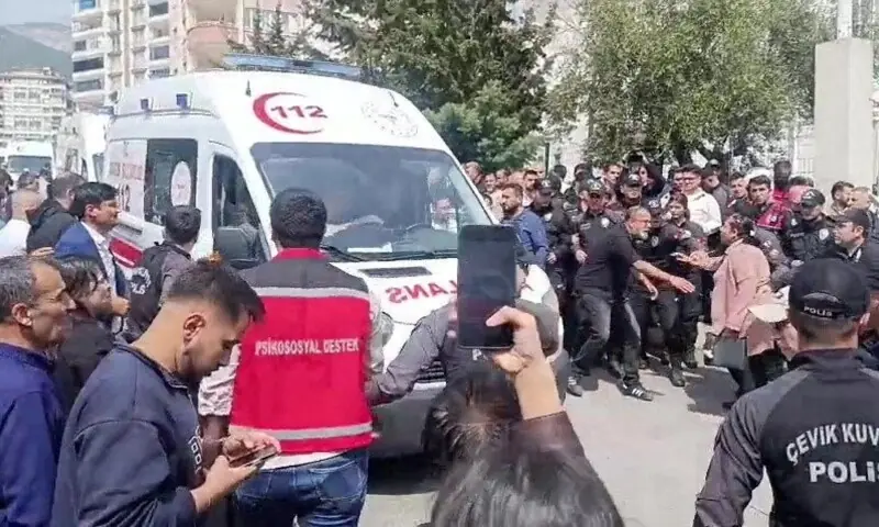 An ambulance leaves the scene following a deadly school shooting, in the southeastern province of Kahramanmaras, Turkiye on April 15. &mdash; Reuters