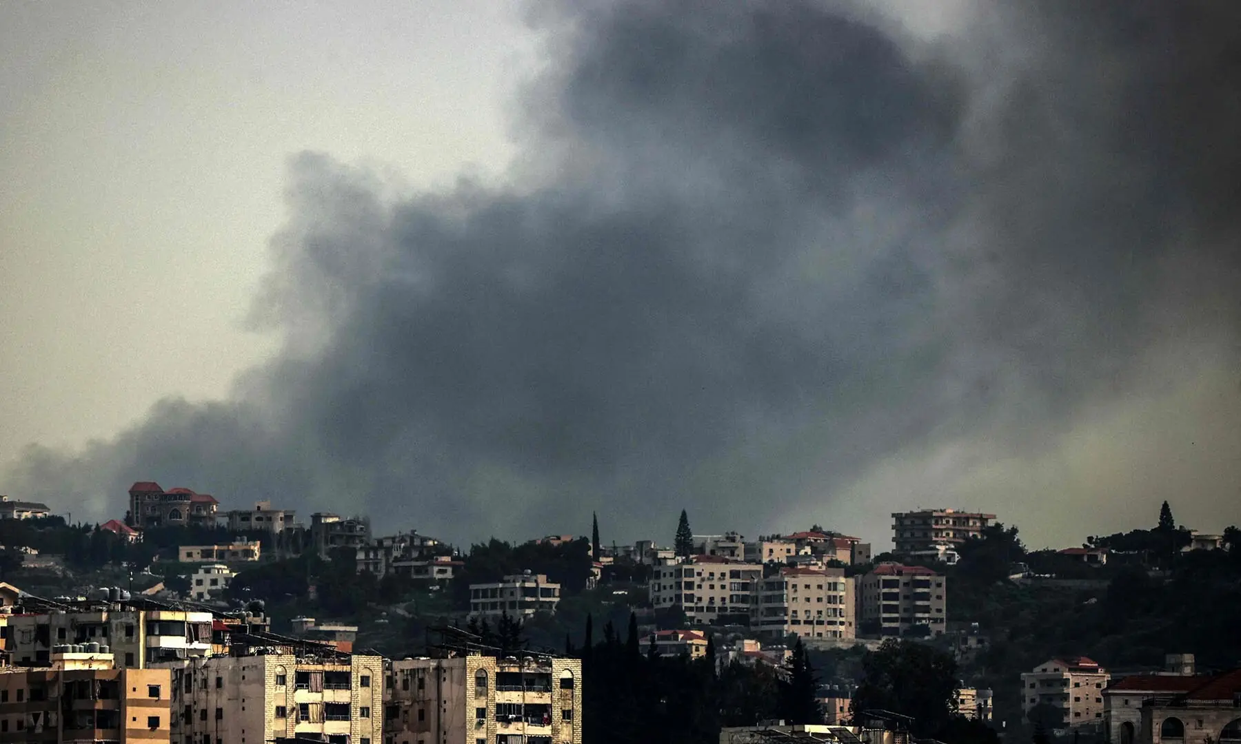 Smoke rises from the site of an Israeli airstrike that targeted the southern Lebanese town of Deir al-Zahrani on April 15, 2026. &mdash; AFP