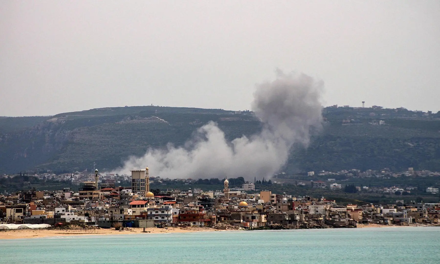 A photo taken from the southern Lebanese area of Tyre shows smoke as it rises from the site of an Israeli airstrike that targeted the village of El Qlaile on April 15, 2026. &mdash; AFP