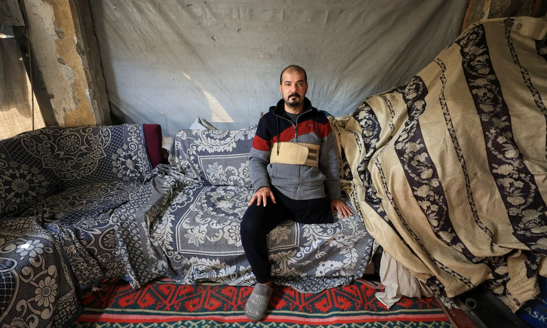 Palestinian amputee Hazem Foura, who lost one leg, sits at his home in Gaza City on April 3, 2026. &mdash; Reuters