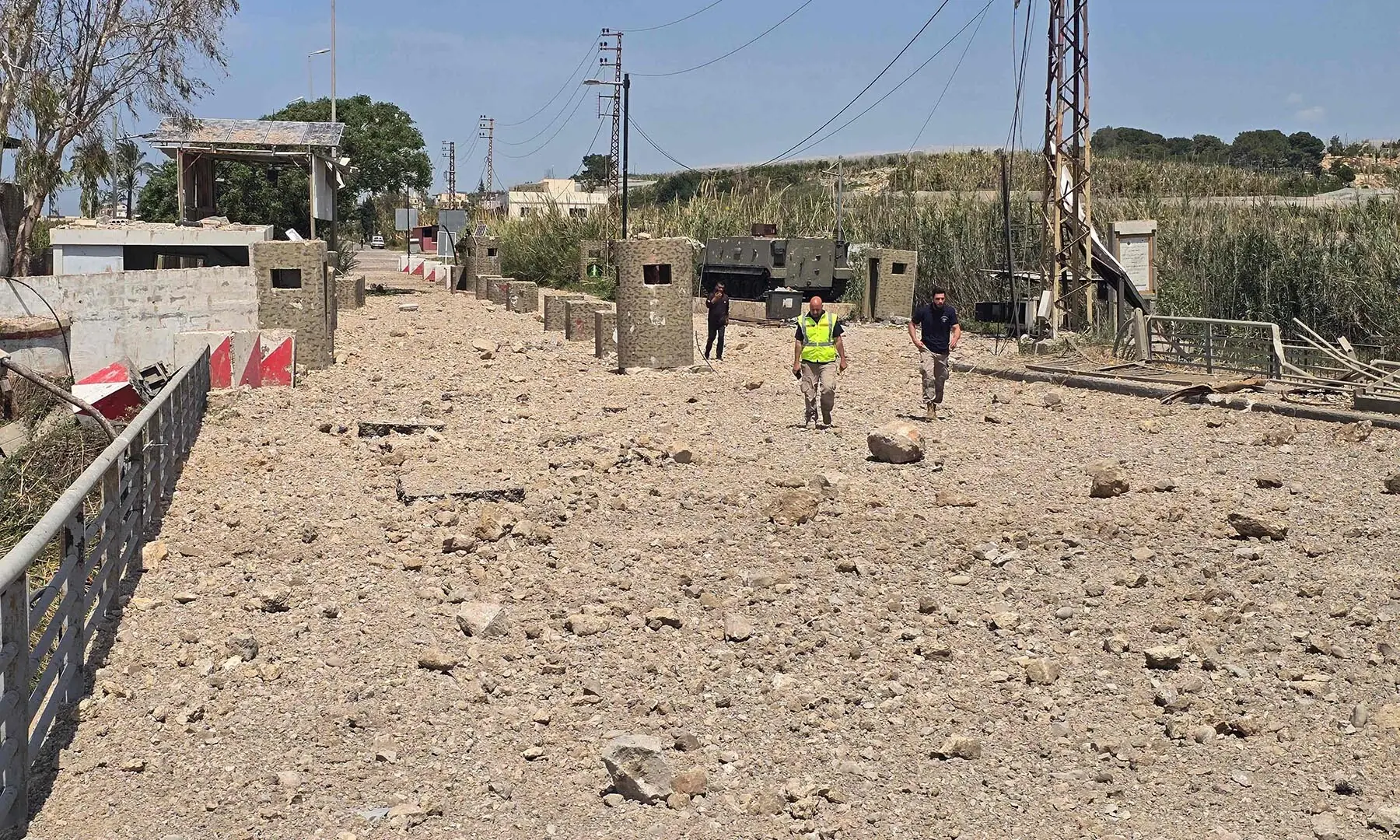 Lebanese army soldiers inspect the site of Israeli strikes on the Qasmieh bridge, built over the Litani River, in the southern Lebanese area of Al Qasmiyeh on April 16, 2026. &mdash; AFP