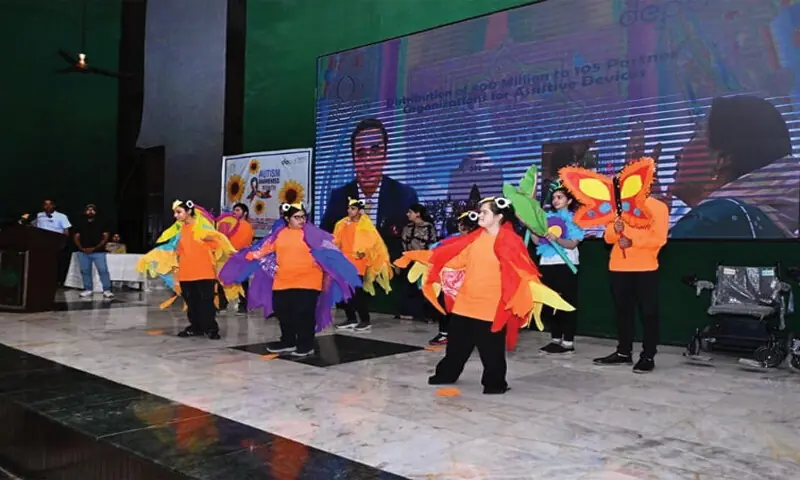 Children stage a performance during the programme. &mdash;Dawn
