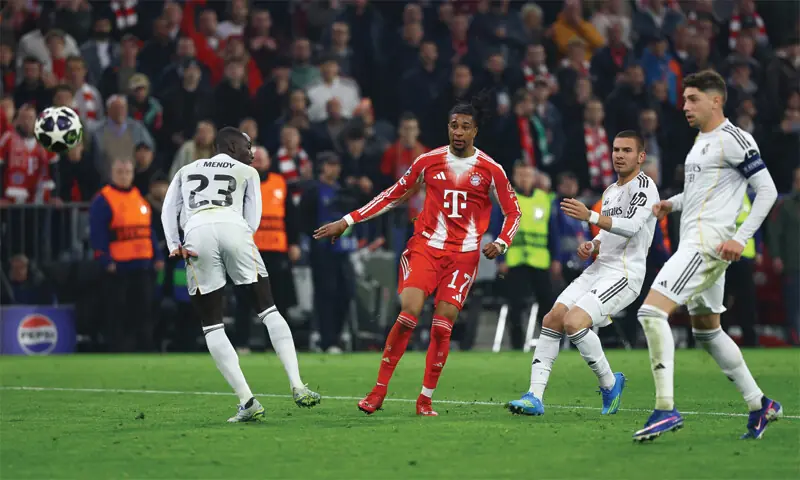 MUNCIH: Bayern Munich’s Michael Olise (second L) scores against Real Madrid during their Champions League quarter-final second leg at the Allianz Arena.—Reuters MUNCIH: Bayern Munich’s Michael Olise (second L) scores against Real Madrid during their Champions League quarter-final second leg at the Allianz Arena.—Reuters