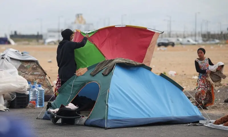 A displaced woman packs her belongings as people prepare to return to their homes after a 10-day ceasefire between Lebanon and Israel went into effect, in Beirut, Lebanon, April 17, 2026. &mdash;Reuters