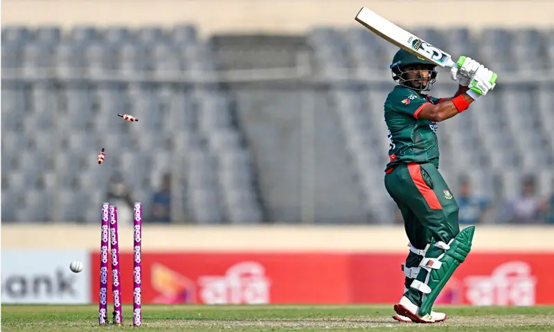 BANGLADESH opener Tanzid Hasan is cleaned up by New Zealand pacer Nathan Smith during the first One-day International at the Sher-e-Bangla National Stadium on Friday.—AFP BANGLADESH opener Tanzid Hasan is cleaned up by New Zealand pacer Nathan Smith during the first One-day International at the Sher-e-Bangla National Stadium on Friday.—AFP