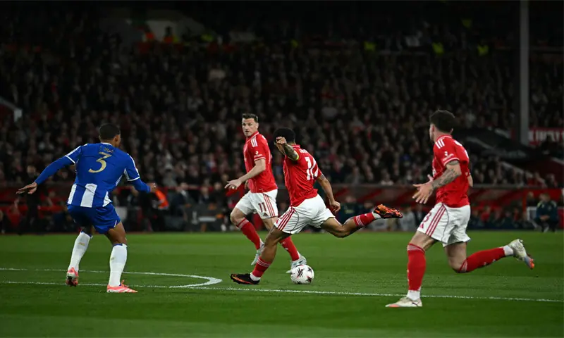 NOTTINGHAM: Morgan Gibbs-White (C) of Nottingham Forest shoots to score against Porto during their Europa League quarter-final second leg at The City Ground.—AFP NOTTINGHAM: Morgan Gibbs-White (C) of Nottingham Forest shoots to score against Porto during their Europa League quarter-final second leg at The City Ground.—AFP