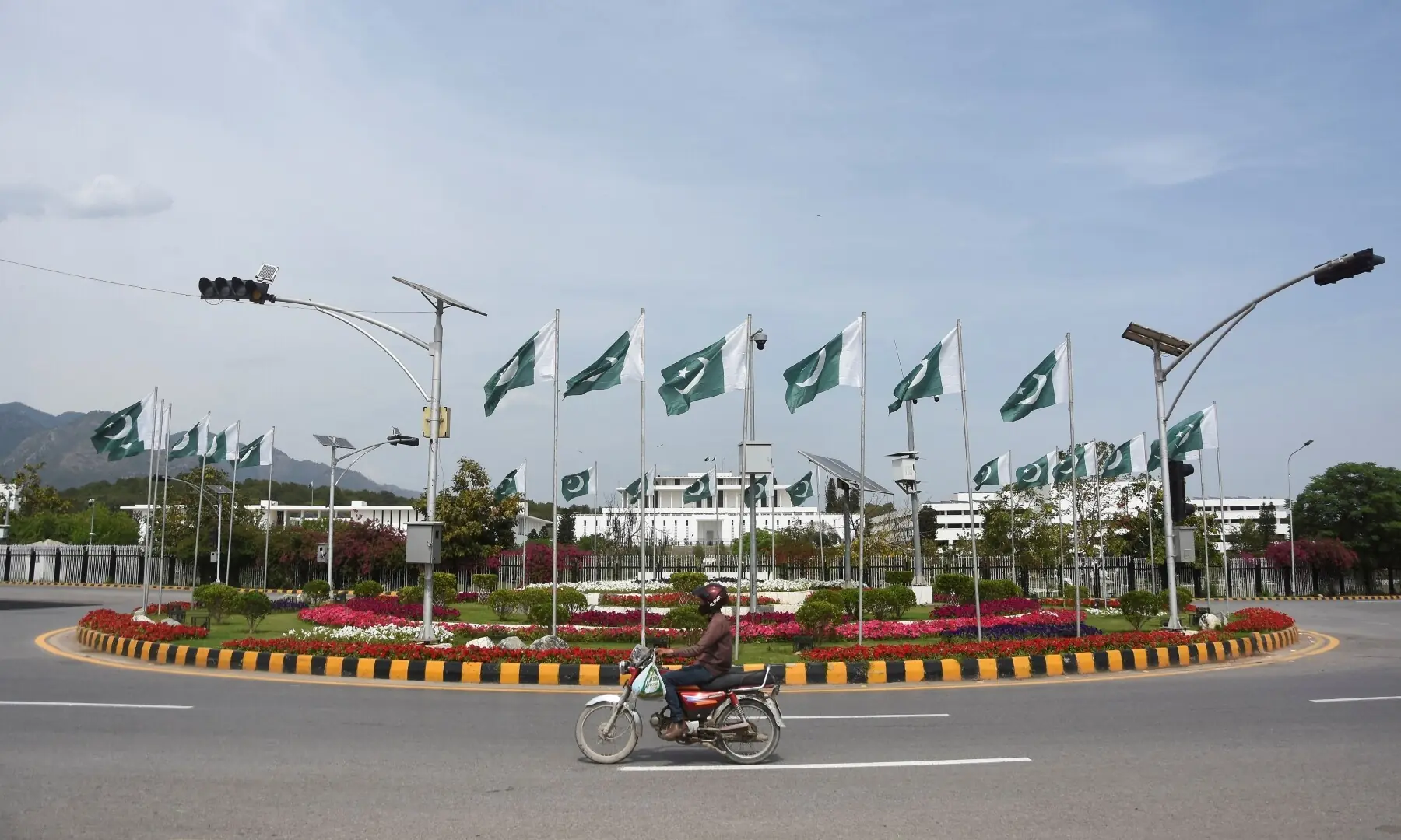 Pakistani flags installed in front of the President&rsquo;s house, as Pakistan prepares to host the US and Iran for the second phase of peace talks in Islamabad, on April 18, 2026. &mdash;Reuters