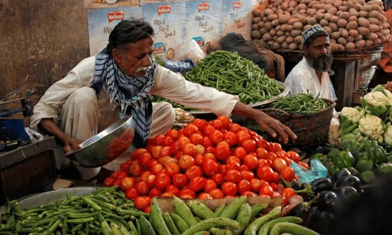 File photo shows a vegetable vendor. &mdash; Reuters/File