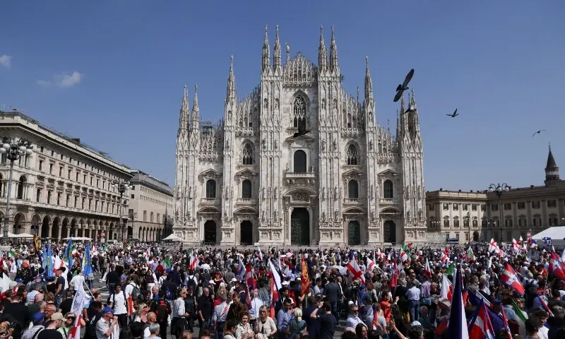 People attend a demonstration in support of the European far-right parties summit, at Duomo square in Milan, Italy, April 18. — Reuters People attend a demonstration in support of the European far-right parties summit, at Duomo square in Milan, Italy, April 18. — Reuters