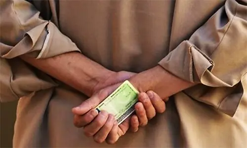 File photo shows a person holding a CNIC. ─ Reuters/File