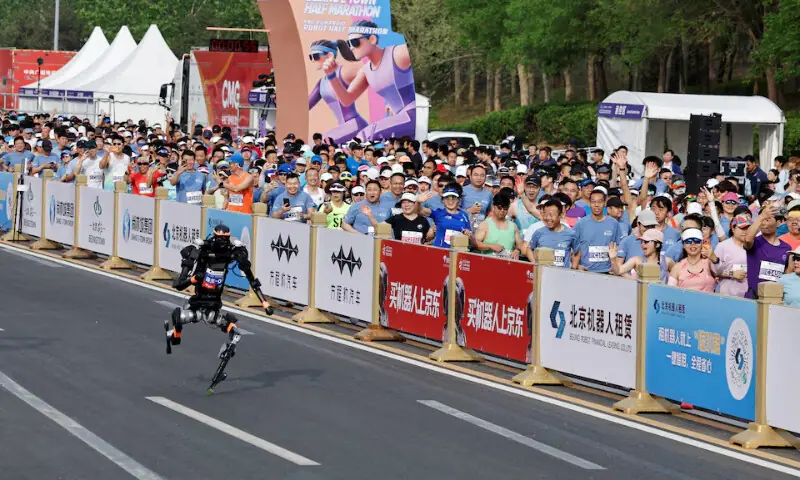 A Unitree H1 humanoid robot takes part during the second Beijing E-Town Half Marathon and Humanoid Robot Half Marathon in Beijing, China on April 19, 2026. &mdash; Reuters