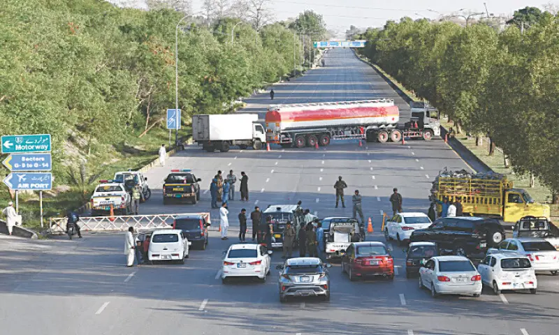 Islamabad Expressway has been blocked with an oil tanker near Zero Point as delegations start arriving in the capital on Sunday in connection with the second round of US-Iran talks in Islamabad. &mdash; Photo by Mohammad Asim