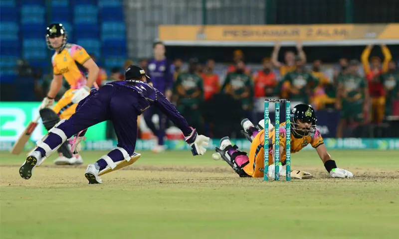 PESHAWAR Zalmi captain Babar Azam completes the run to reach his century against Quetta Gladiators during the Pakistan Super League match at the National Bank Stadium on Sunday.&mdash;Tahir Jamal/White Star