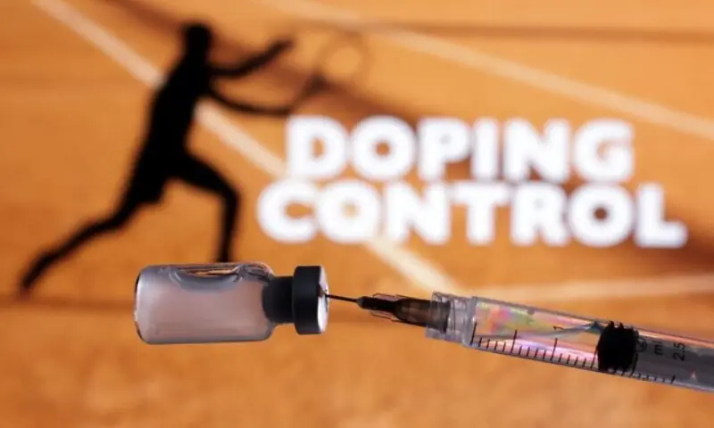 Silhouette of tennis player, vial and syringe and words &ldquo;Doping Control&rdquo; are seen in this illustration taken May 6, 2025. &mdash;Reuters