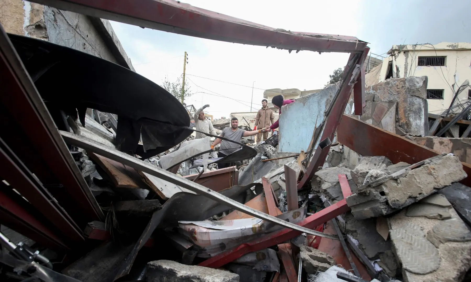 People try to salvage items from the rubble of their destroyed house after returning to the southern Lebanese city of Nabatieh on April 20, 2026. &mdash; AFP