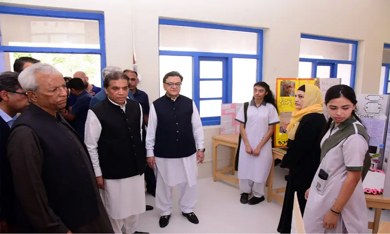 Governor Nehal Hashmi and Railways Minister Hanif Abbasi inspect a classroom after inaugurating the Pakistan Railways campus of the International School.—APP Governor Nehal Hashmi and Railways Minister Hanif Abbasi inspect a classroom after inaugurating the Pakistan Railways campus of the International School.—APP