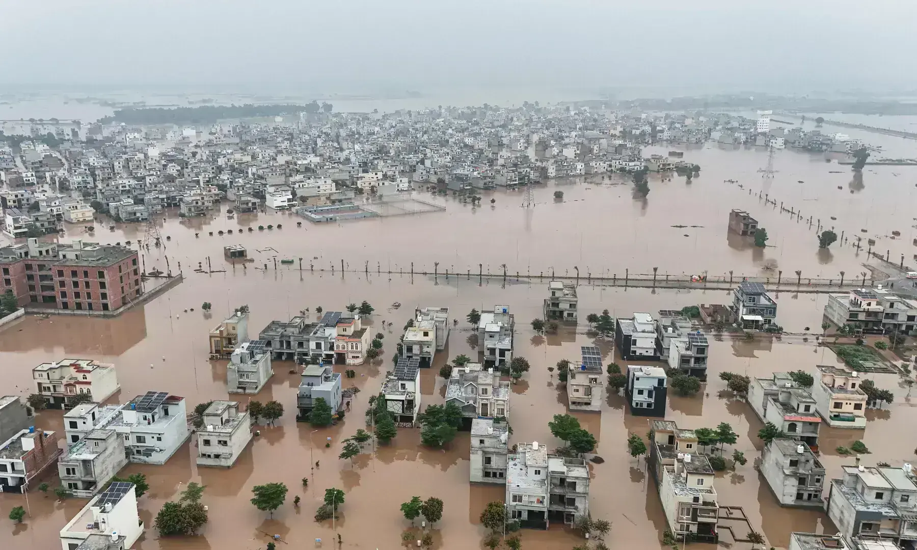 This aerial view shows partially submerged residential buildings following the overflowing of the Ravi River in Lahore on August 30, 2025. &mdash; AFP/File