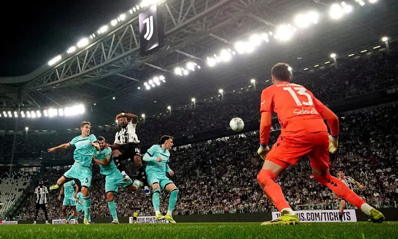 TURIN: Khephren Thuram (C) of Juventus heads to score past Bologna goalkeeper Federico Ravaglia during their Serie A match at the Allianz Stadium.&mdash;Reuters