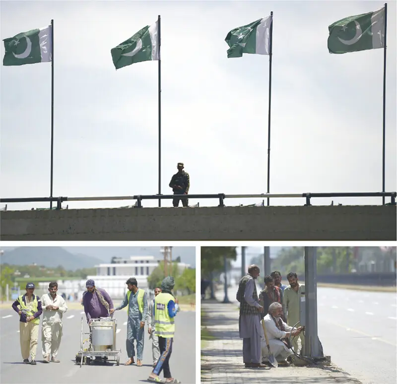 (Clockwise from top) A security official stands guard at Zero Point flyover as workers repair a streetlight pole on Jinnah Avenue and fix road markers at D-Chowk in Islamabad on Monday. — Photos by Mohammad Asim (Clockwise from top) A security official stands guard at Zero Point flyover as workers repair a streetlight pole on Jinnah Avenue and fix road markers at D-Chowk in Islamabad on Monday. — Photos by Mohammad Asim