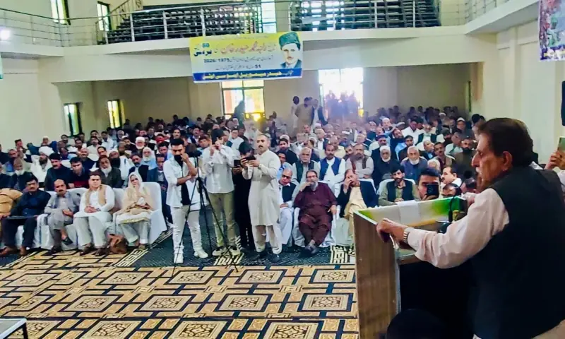 PML-N leader and former AJK premier Raja Farooq Haider addresses a ceremony in Muzaffarabad on Monday, marking the 60th anniversary of his father Raja Muhammad Haider Khan. &mdash; photo by author