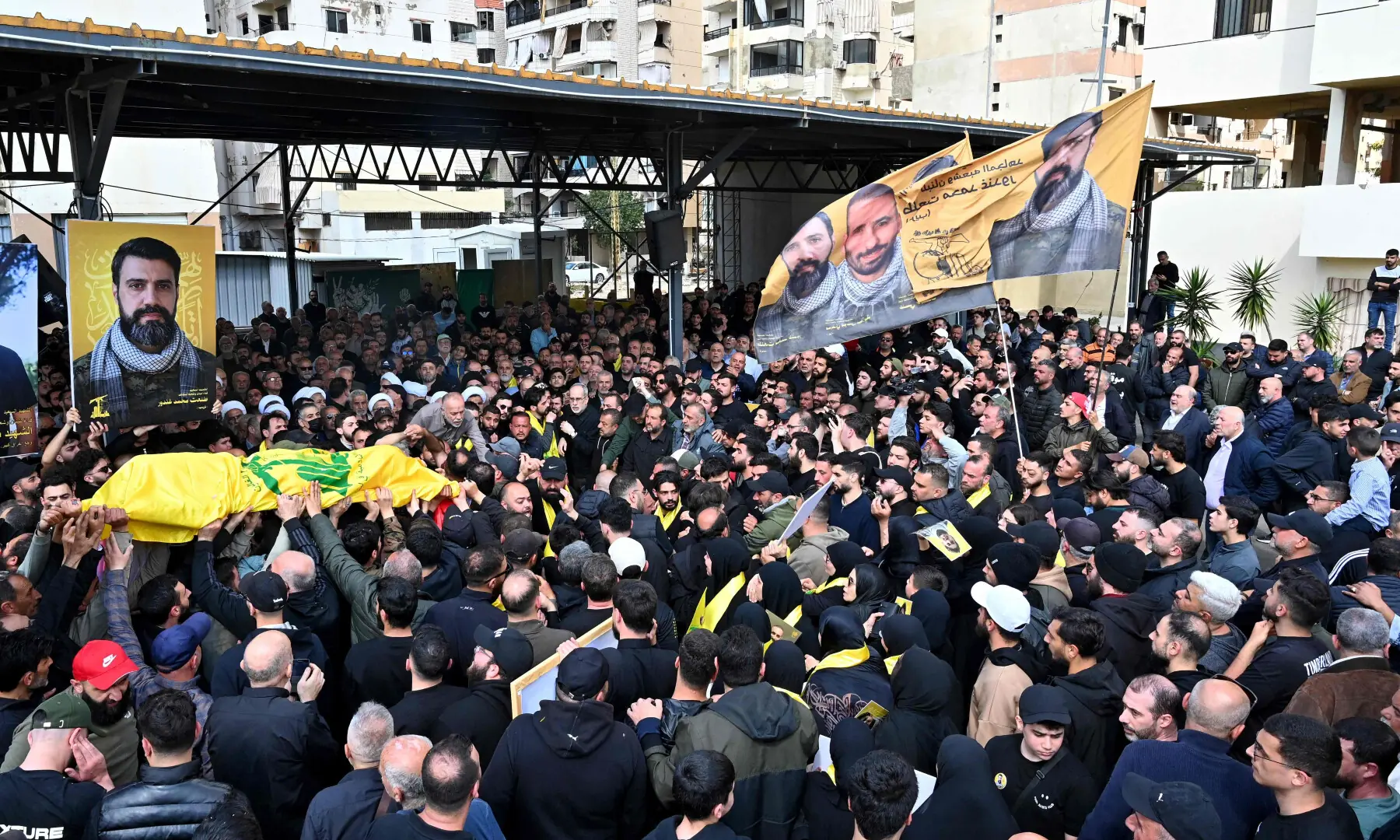 Mourners carry the flag-draped casket of a member of Hezbollah who was killed in southern Lebanon during their funeral in the Kafaat area in Beirut’s southern suburbs on April 20, 2026. — AFP