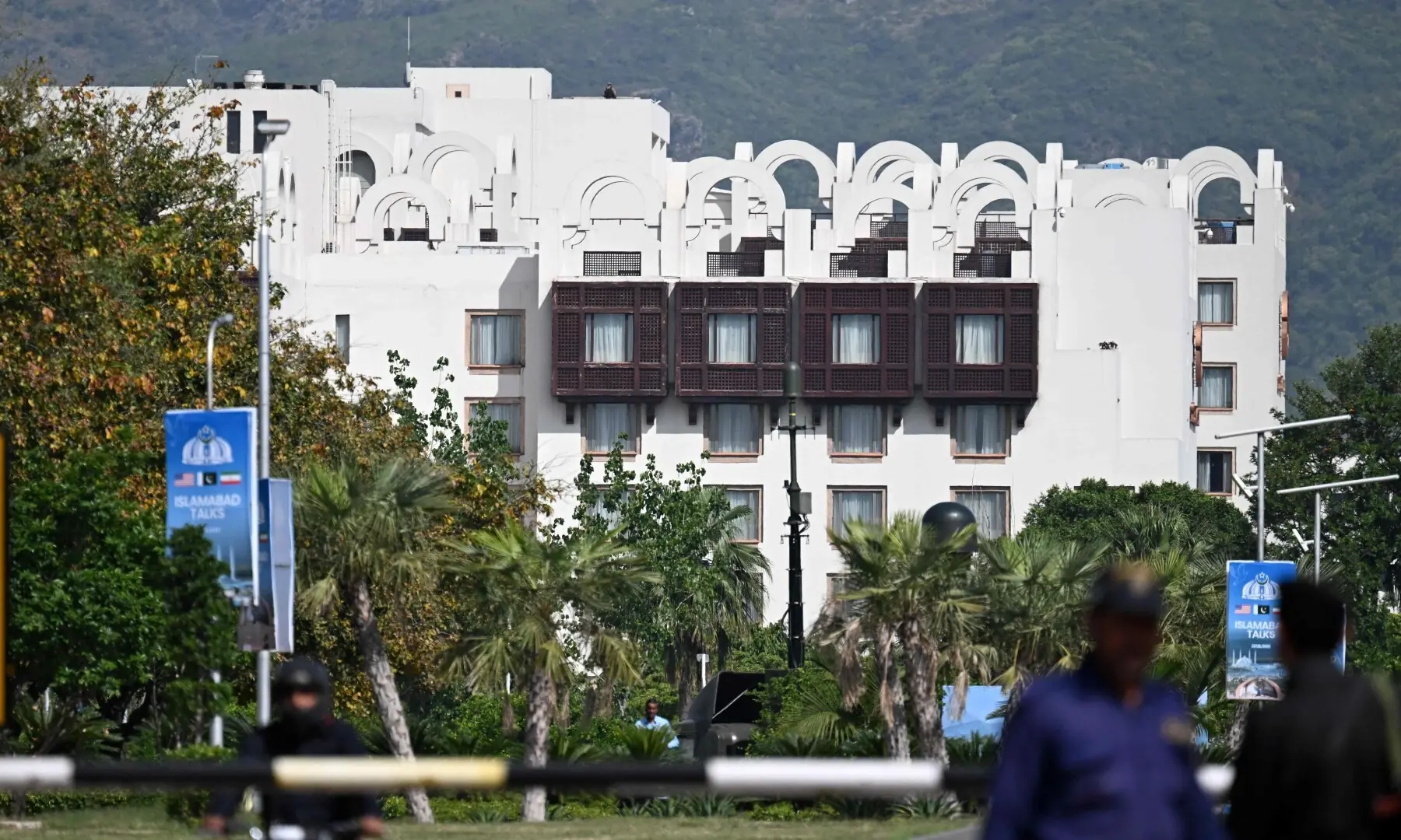 Police personnel stand guard near the Serena Hotel in Islamabad&rsquo;s Red Zone on April 21, 2026, amid heightened security measures ahead of possible US-Iran peace talks. &mdash; AFP