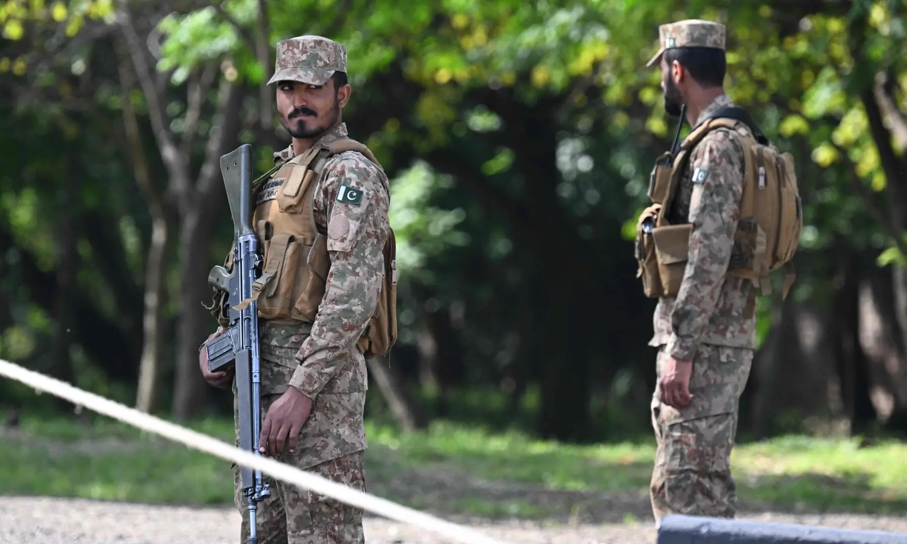 Army personnel stand guard along a closed road near the Serena Hotel in Islamabad&rsquo;s Red Zone on April 21, 2026, amid heightened security measures ahead of possible US-Iran peace talks. &mdash; AFP