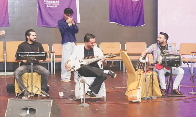 A musical group performs at Nishtar Hall, Peshawar, on the final day of the literature festival. &mdash; Dawn