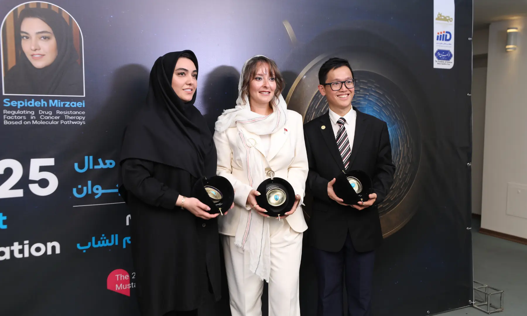  Recipients of the Young Scientist Award: Sepideh Mirzaei (Cancer therapy drug resistance), Buse Cevatemre (Epigenetic adaptations in chemotherapy), and Show Pau Loke (Algal technology for food and aquatic industries). &mdash; photo by MSTF, Iran 