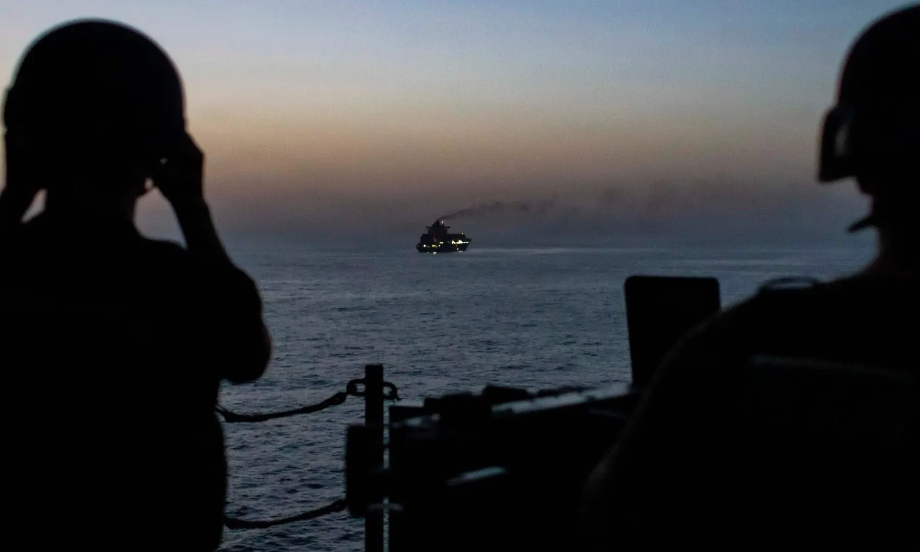 This US Navy handout photograph released on April 21, 2026, by US Central Command, shows US forces patrolling the Arabian Sea near the Touska, an Iranian-flagged cargo ship, on April 20, 2026. &mdash; AFP