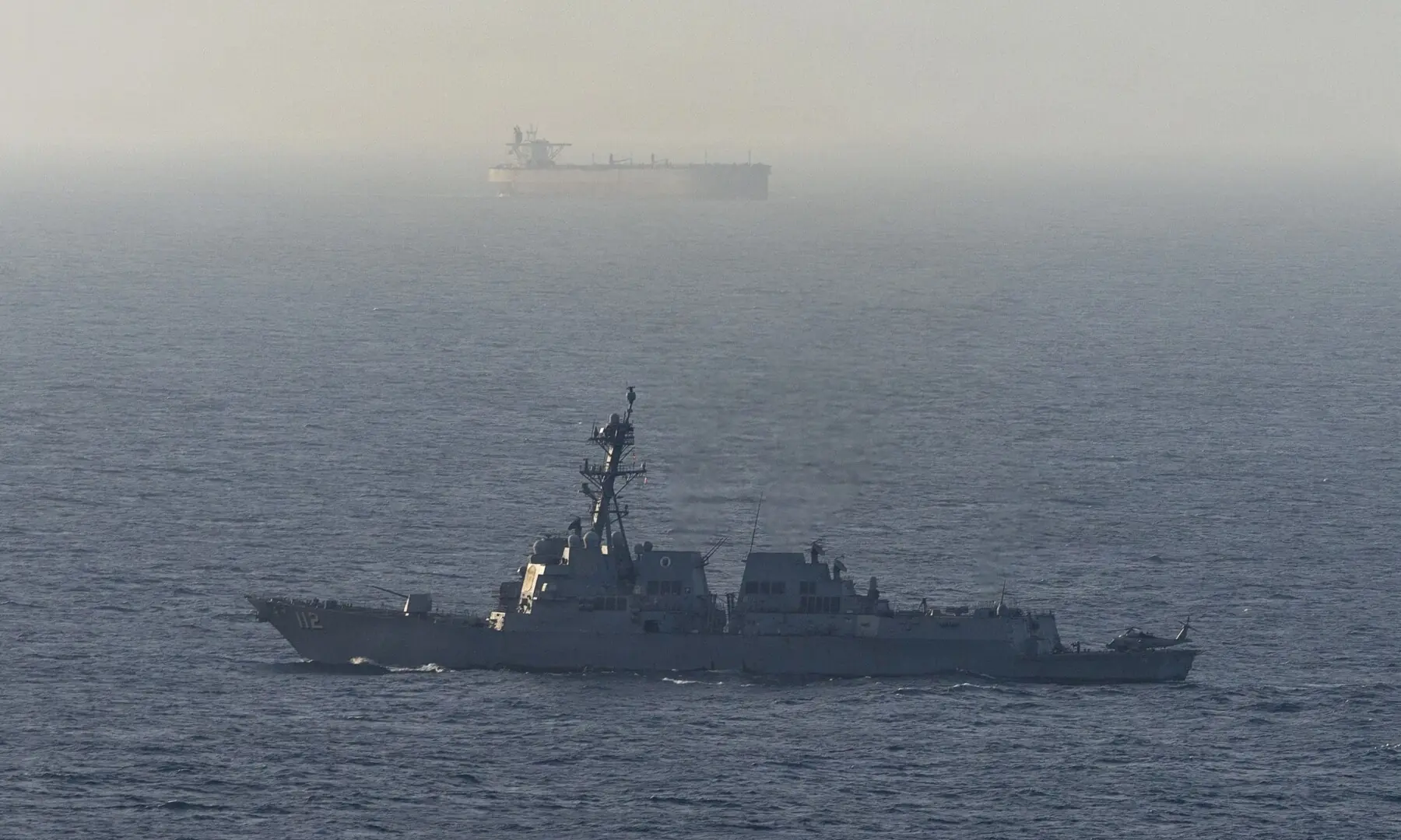 This US Navy handout photograph released on April 21, 2026, by US Central Command, shows the Arleigh Burke-class guided-missile destroyer USS Michael Murphy patrolling the Arabian Sea during a maritime blockade on April 15, 2026. &mdash; AFP