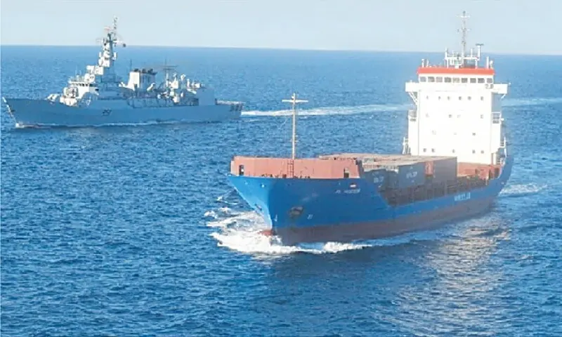 A Navy ship escorts a merchant vessel in Arabian Sea.—Courtesy PN A Navy ship escorts a merchant vessel in Arabian Sea.—Courtesy PN