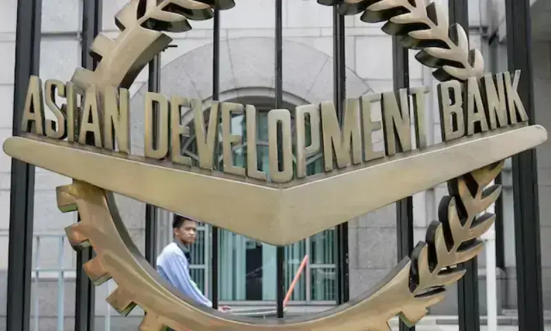 A worker walks past inside the Asian Development Bank (ADB) headquarters in Manila, on June 17, 2009. — Reuters/File A worker walks past inside the Asian Development Bank (ADB) headquarters in Manila, on June 17, 2009. — Reuters/File