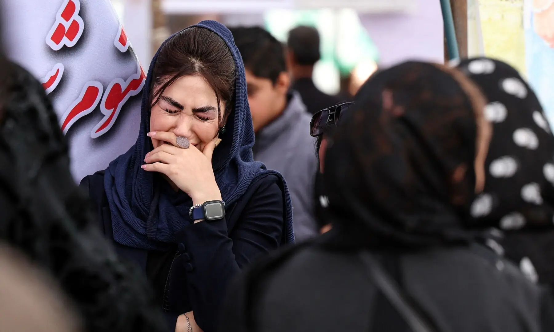 An Iranian woman mourns at the grave of a loved one killed during the US-Israeli war on Iran at the Behesht Zahra Cemetery in southern Tehran on April 23, 2026. &mdash; AFP