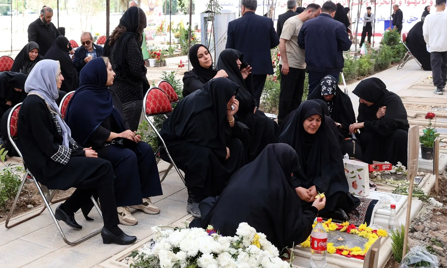 Iranians mourn at the graves of their loved ones killed during the US-Israeli war on Iran at the Behesht Zahra Cemetery in southern Tehran on April 23, 2026. &mdash; AFP
