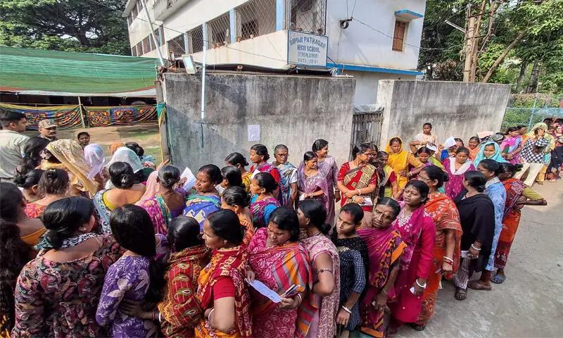 Voters queue to cast their votes outside a polling station during the West Bengal Legislative Assembly elections in Berhampore, Murshidabad district.&mdash;AFP